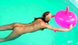 Sensuous light-haired in the pool and the chick is having joy with a larger pink sex toy
